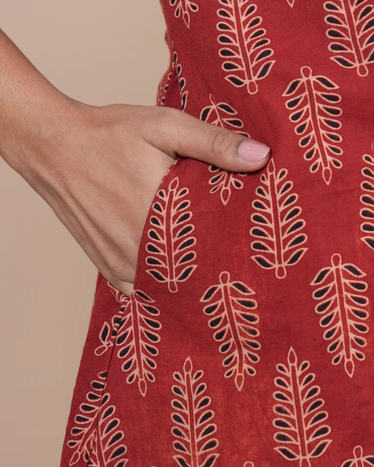 Zyra Ajrakh print cotton kurti in madder red with beige leaf motifs â€” side view | Kaarigar